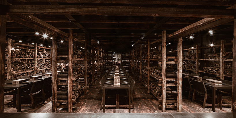 cadena+asociados' rustic carboncabron grillhouse uses thousands of wood logs - 1