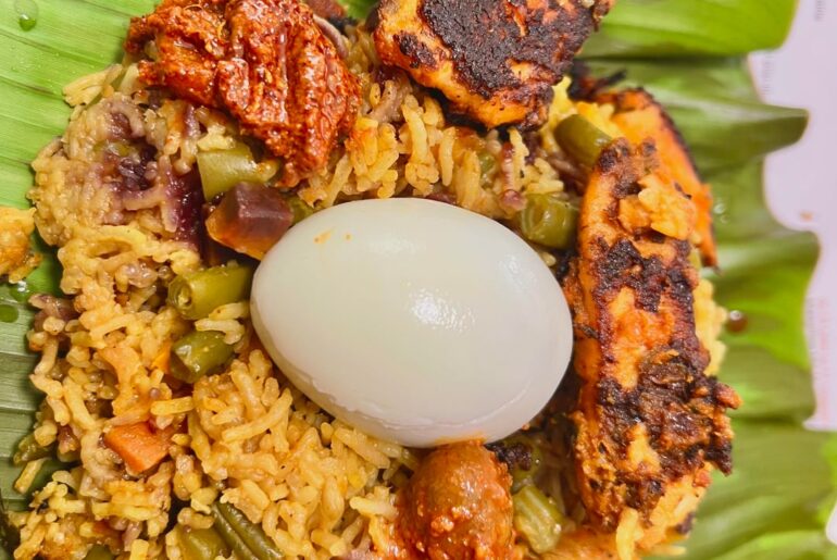 [Homemade] Spicy Veg Biriyani with Salmon wrapped in a banana leaf