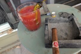 Michelada with garlic reaper sauce and a fire roasted pueblo green chile for garnish