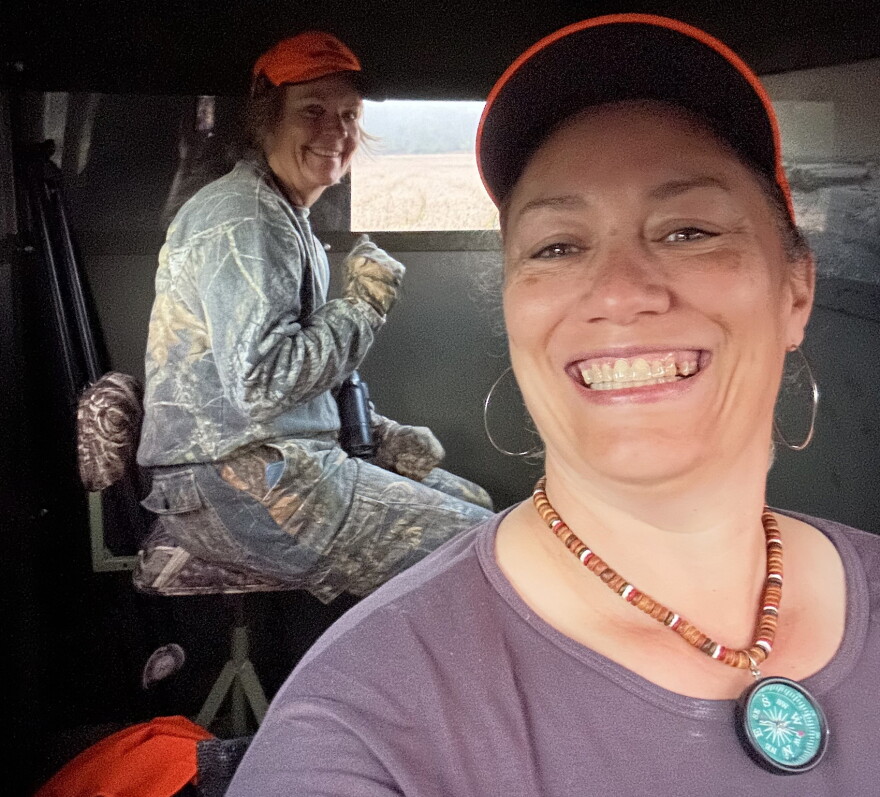 Wild Foods Academy participants Leonore Enfield and Jackie Taylor sit in a deer stand during Enfield’s first deer hunt last fall.