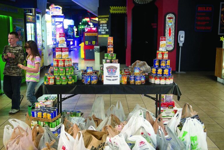 Police reach out: ‘Handcuff Hunger’ event nets food, $2,029 | Local
