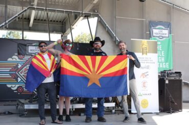 Three men from Wren House Brewing Co. accept their gold medals from the Great American Beer Festival awards on Sunday.