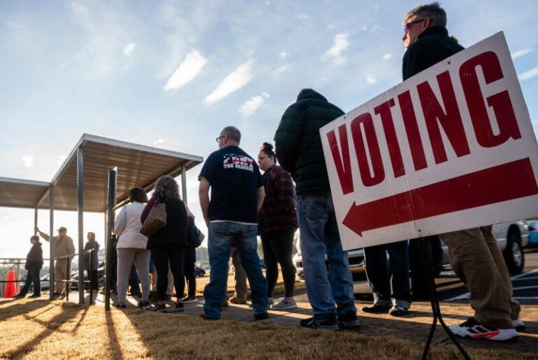 Judge blocks challenge to ban on giving food and drinks to Georgia voters waiting in line