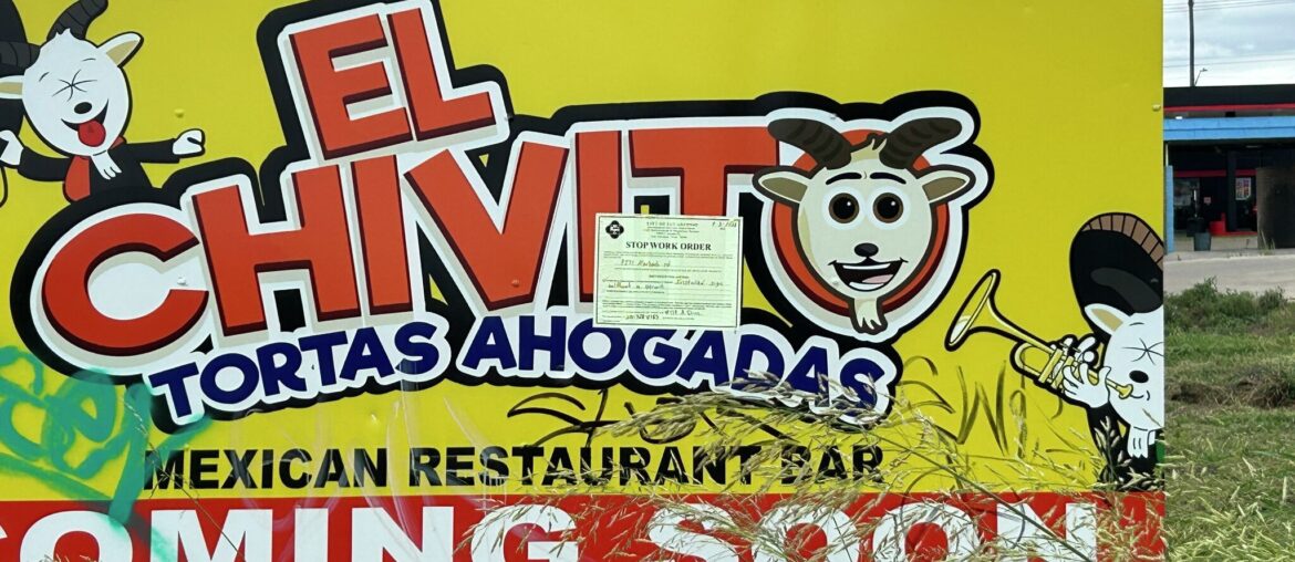 A "coming soon" sign for El Chivito's upcoming project. 