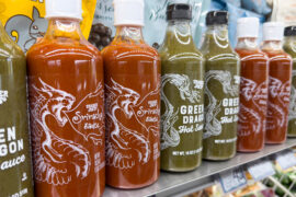 One Trader Joe's Hot Sauce Is A Cheaper (And Disappointing) Dupe Worth Skipping