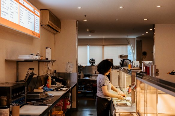 He Ming Wang and Li Hua Ma are the only employees at the Fortitude Valley sandwich spot.