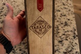 Trying to figure out a value on this: tobacco 150th anniversary sealed wooden box